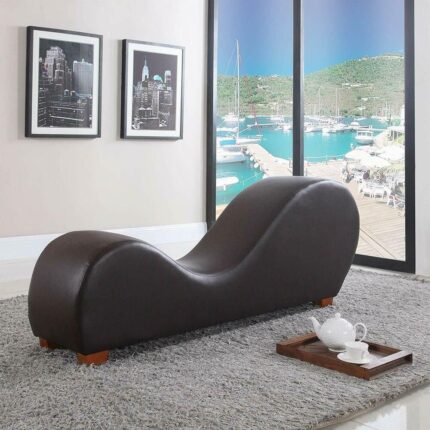 modern brown wave shaped lounge chair in a stylish living room floor to ceiling windows