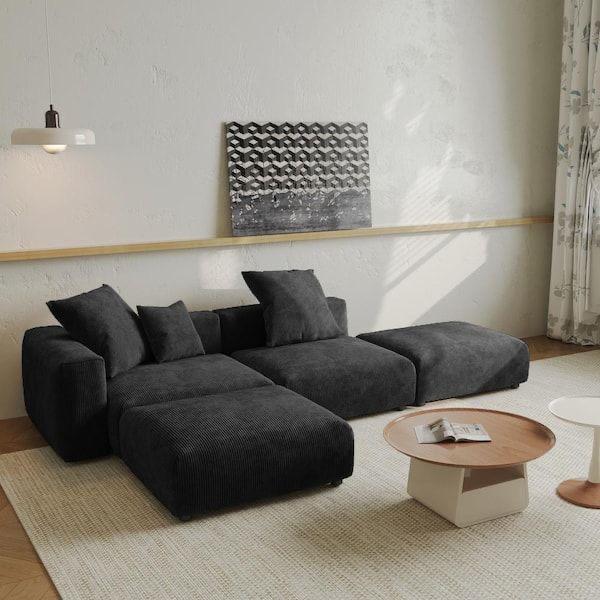 Bria l shaped couch black corduroy A modern Bria L-shaped couch upholstered in soft black corduroy fabric, featuring deep seating, plush cushions, and a cozy contemporary design ideal for any living room.